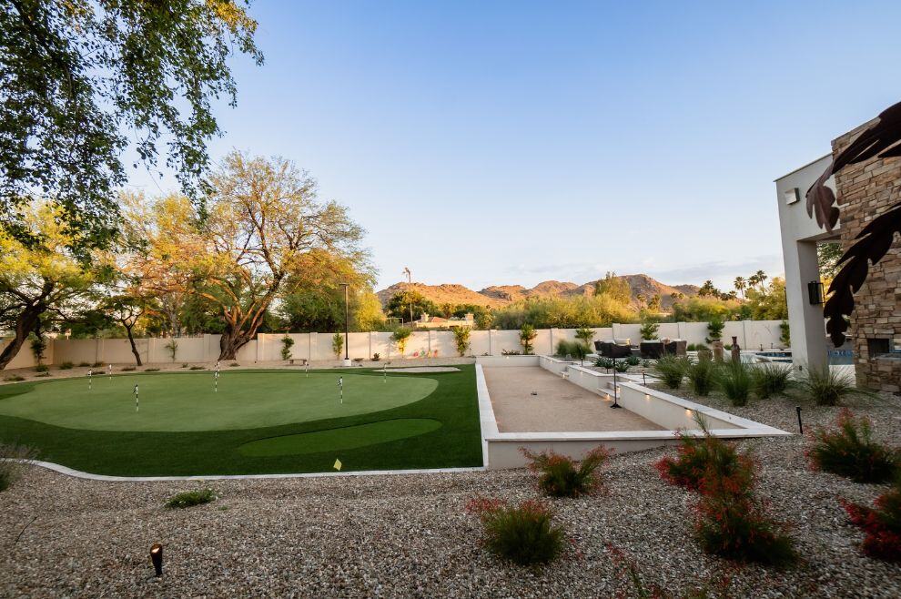 Backyard home renovation in phoenix featuring golf course overlooking mountains