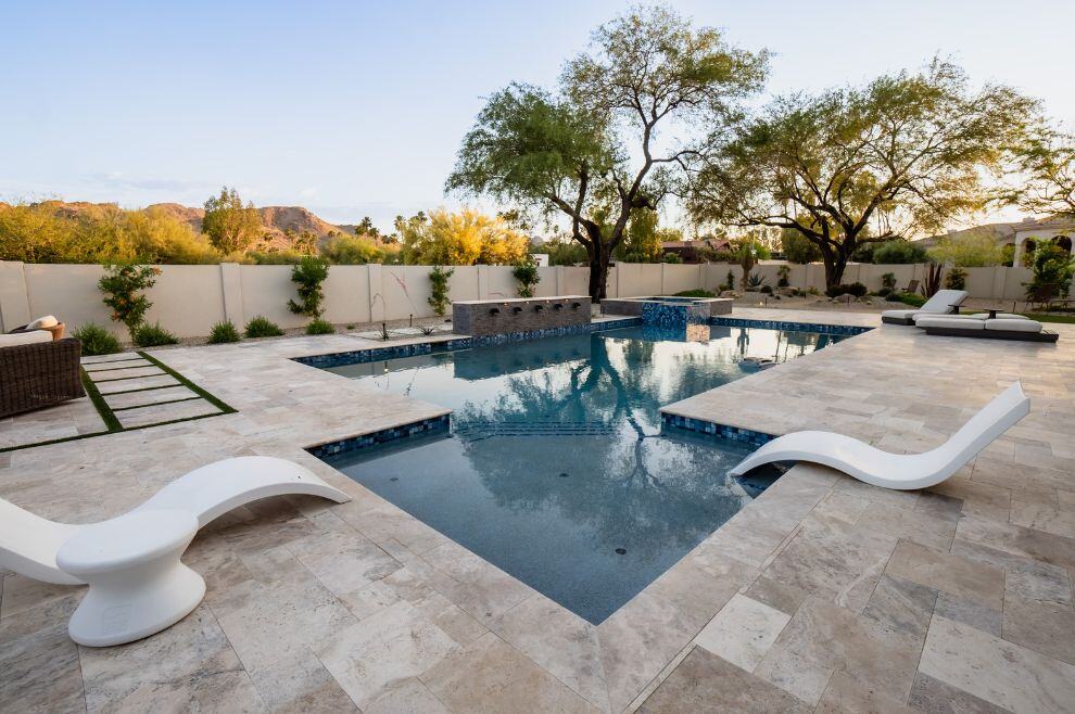 Lounge chairs in a custom patio renovation overlooking mountains in Phoenix