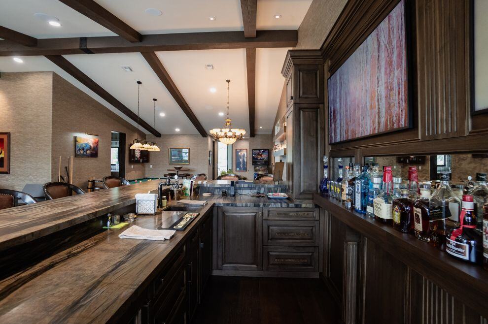 Custom home bar renovation with dark cabinets in home remodel in Phoenix AZ