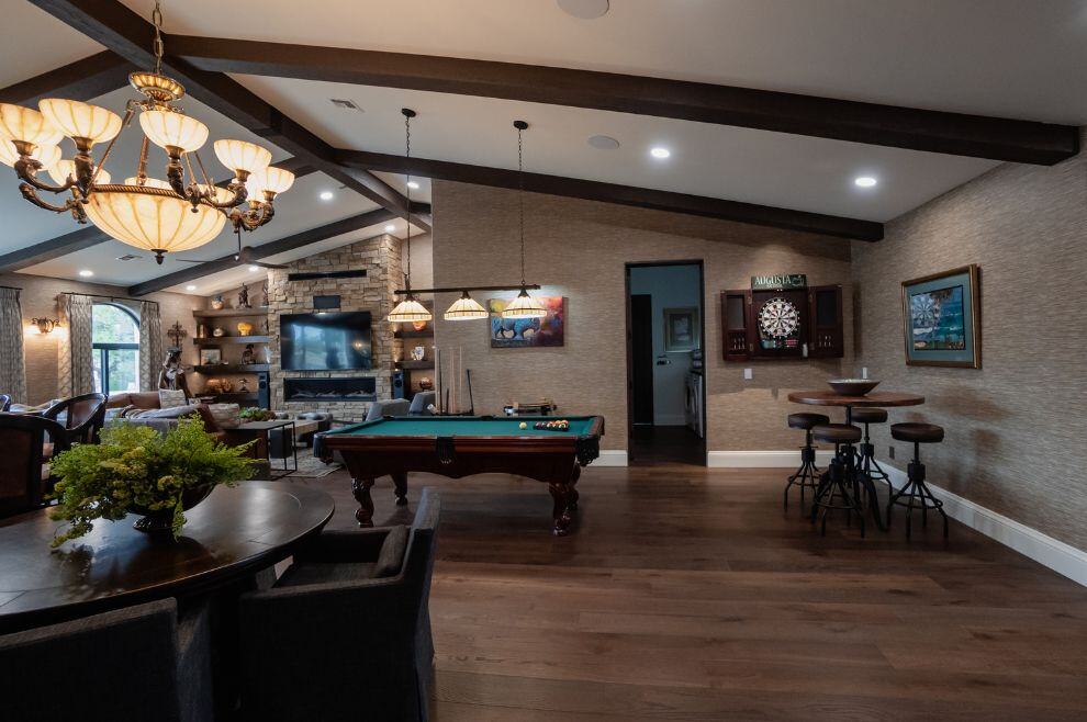 Custom basement remodel with gaming pool and card table seating