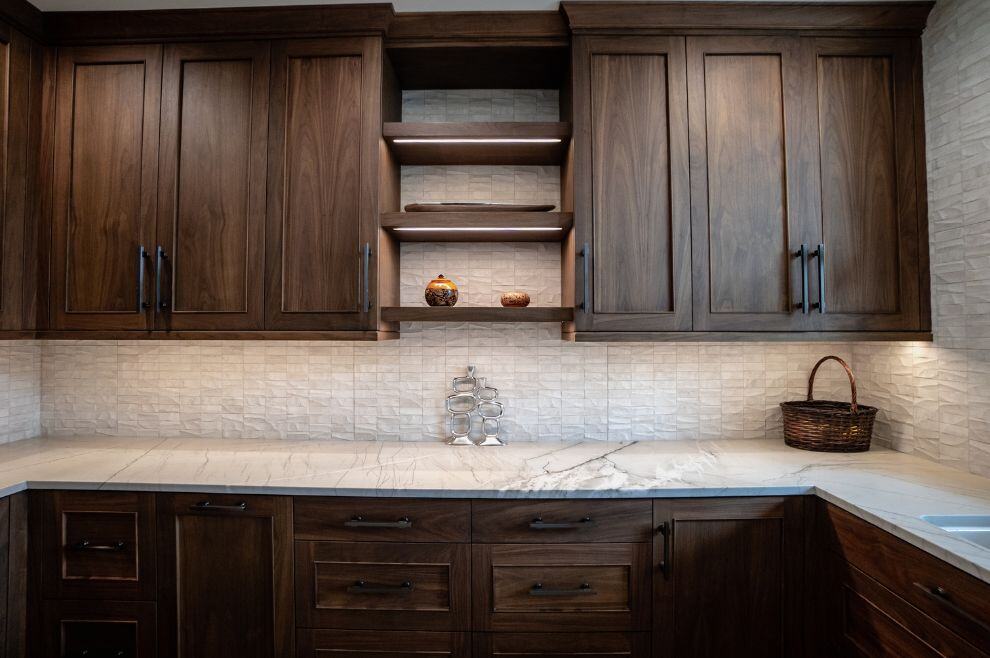 Custom Kitchen pantry remodel with dark wood cabinets and light counters